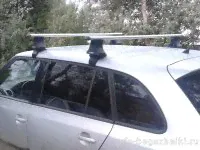 Багажник на крышу Skoda Fabia MK2 универсал, Атлант, аэродинамические дуги-1